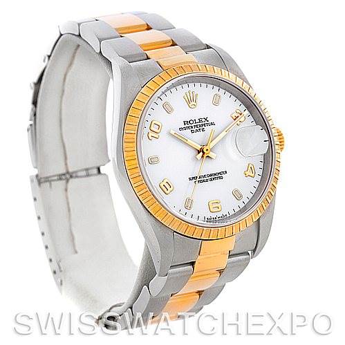 The image shows a front-side view of the Rolex Date 15223 Men's Steel and Gold (two tone) White Dial 15223 Men's Steel and Gold (two tone) White Dial watch, highlighting its two-tone bracelet and fluted bezel.