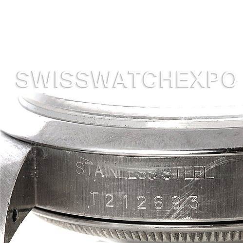 The image shows a close-up angle of the side of a Rolex Date 15200 Men's Stainless Steel Blue Dial 15200 Men's Stainless Steel Blue Dial model watch, highlighting the stainless steel marking and serial number.