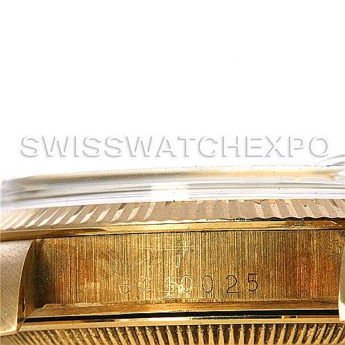 This image shows a close-up side view of the case and serial number of a Rolex Date 1503 Men's Yellow Gold Silver Dial 1503 Men's Yellow Gold Silver Dial watch.