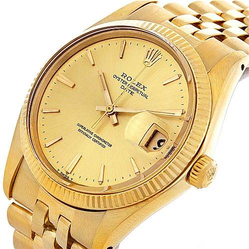 This Rolex Date 1503 Men's Yellow Gold Champagne Dial 1503 Men's Yellow Gold Champagne Dial model is shown from a slightly tilted top-down angle, displaying its face, crown, and bracelet.
