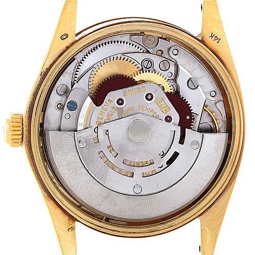 The image shows the internal movement and mechanisms of a Rolex Date 1503 Men's Yellow Gold Champagne Dial 1503 Men's Yellow Gold Champagne Dial model watch from a back view with the case back removed.