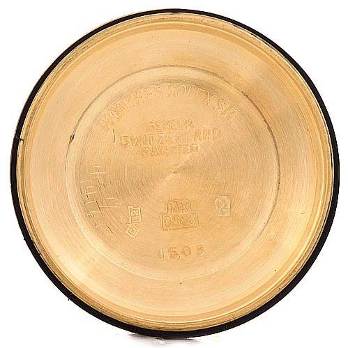 This image shows the inside of the case back for a Rolex Date 1503 Men's Yellow Gold Champagne Dial 1503 Men's Yellow Gold Champagne Dial model watch, engraved with various markings and numbers.