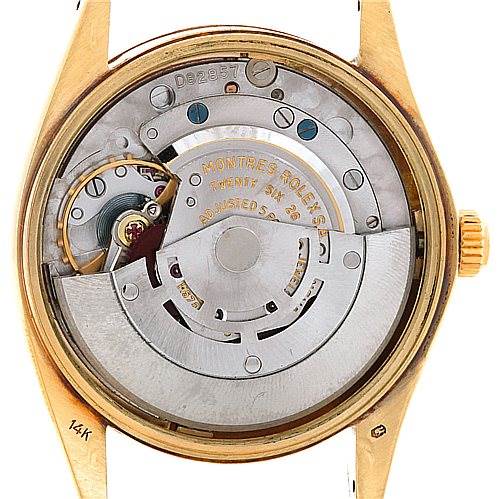 This image shows the back view of a Rolex Date 1503 Men's Yellow Gold Champagne Dial 1503 Men's Yellow Gold Champagne Dial model watch, highlighting its internal movement and components.