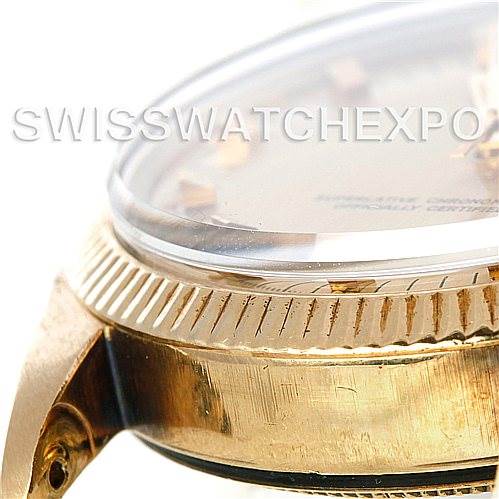 This close-up angle shows the side and bezel of a Rolex Date 1503 Men's Yellow Gold Champagne Dial 1503 Men's Yellow Gold Champagne Dial watch.