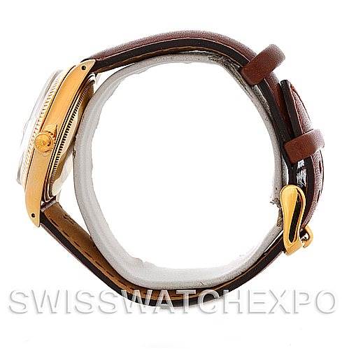 The image shows a side profile view of a Rolex Date 1503 Men's Yellow Gold Champagne Dial 1503 Men's Yellow Gold Champagne Dial model watch, highlighting the case, crown, and leather strap.