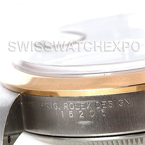 This image shows a close-up side view of a Rolex Date 15203 Men's Steel and Gold (two tone) Black Dial 15203 Men's Steel and Gold (two tone) Black Dial model, highlighting the case with "ORIG. ROLEX DESIGN 15203" engraved.