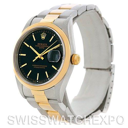 The image shows a three-quarter view of a Rolex Date 15203 Men's Steel and Gold (two tone) Black Dial 15203 Men's Steel and Gold (two tone) Black Dial model watch, highlighting its black dial, gold bezel, and two-tone bracelet.