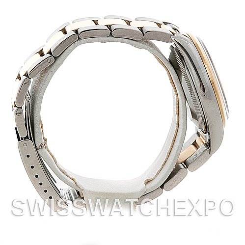 The image shows a side view of a Rolex Date 15203 Men's Steel and Gold (two tone) Black Dial 15203 Men's Steel and Gold (two tone) Black Dial model watch, highlighting the bracelet, clasp, and case edge.