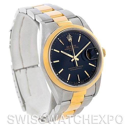 The image shows a Rolex Date 15203 Men's Steel and Gold (two tone) Black Dial 15203 Men's Steel and Gold (two tone) Black Dial watch with a two-tone bracelet, viewed from an angled perspective highlighting its dial and band.