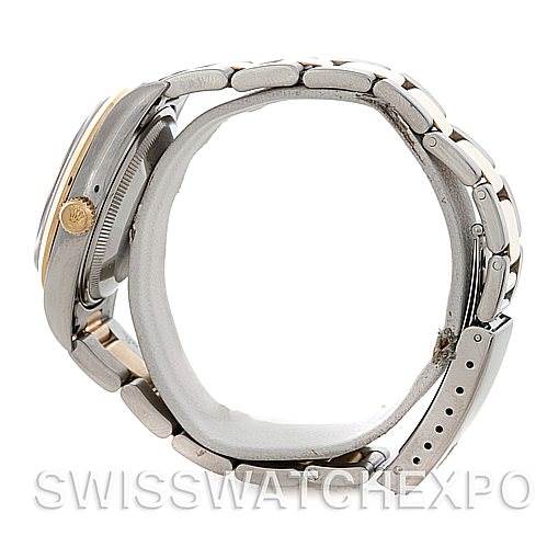 The image shows a side view of the Rolex Date 15203 Men's Steel and Gold (two tone) Black Dial 15203 Men's Steel and Gold (two tone) Black Dial watch, focusing on the band, clasp, and side of the case.