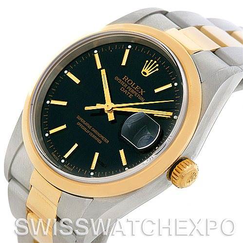 This image shows a Rolex Date 15203 Men's Steel and Gold (two tone) Black Dial 15203 Men's Steel and Gold (two tone) Black Dial model watch from an oblique angle, highlighting its black dial, gold accents, and two-tone bracelet.