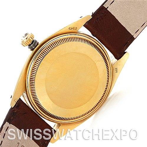 The image shows the back case and partial strap of a Rolex Date 1503 Men's Yellow Gold Silver Dial 1503 Men's Yellow Gold Silver Dial model watch, viewed from the rear top angle.