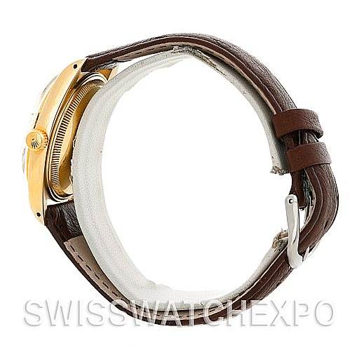 The image shows a side view of a Rolex Date 1503 Men's Yellow Gold Silver Dial 1503 Men's Yellow Gold Silver Dial model watch with a leather strap and visible crown and case edges.