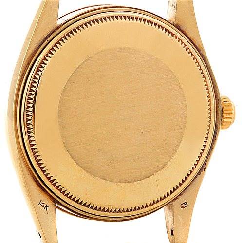 The image shows the back of the case and lugs of a Rolex Date 1503 Men's Yellow Gold Champagne Dial 1503 Men's Yellow Gold Champagne Dial model watch.