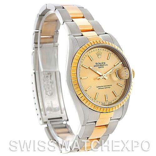 This image shows a side angle of the Rolex Date 15223 Men's Steel and Gold (two tone) Champagne Dial 15223 Men's Steel and Gold (two tone) Champagne Dial model, displaying the gold and silver bracelet, bezel, dial, and open clasp.