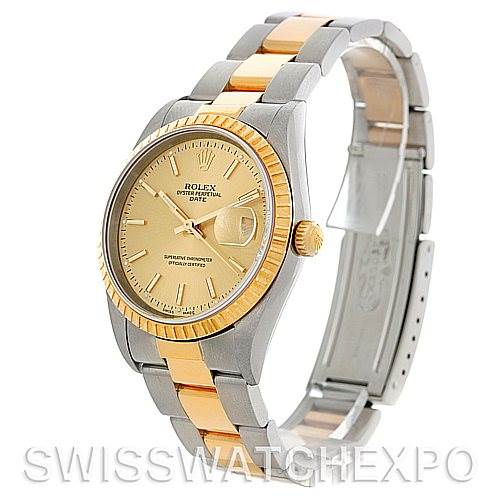 The image shows a Rolex Date 15223 Men's Steel and Gold (two tone) Champagne Dial 15223 Men's Steel and Gold (two tone) Champagne Dial watch at a three-quarter angle, highlighting the gold and silver bracelet, gold bezel, and cream dial.