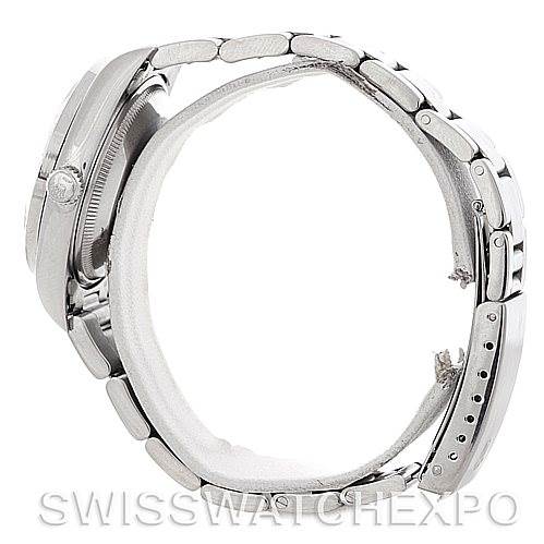 This image shows a side view of a Rolex Date 15210 Men's Stainless Steel Blue Dial 15210 Men's Stainless Steel Blue Dial model, focusing on the watch case, crown, and bracelet.