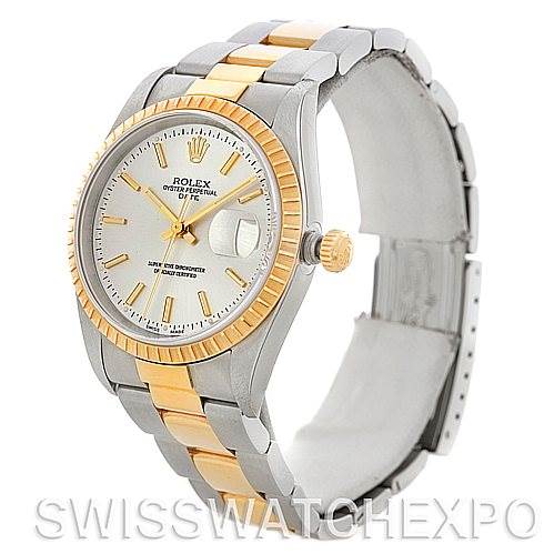 This image shows a Rolex Date 15223 Men's Steel and Gold (two tone) Silver Dial 15223 Men's Steel and Gold (two tone) Silver Dial model watch from an angled view, highlighting its two-tone bracelet, fluted bezel, and dial with date window.