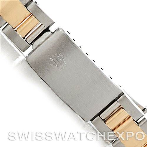 This image shows the clasp of a Rolex Date 15203 Men's Steel and Gold (two tone) Black Dial 15203 Men's Steel and Gold (two tone) Black Dial model watch, highlighting the two-tone metal bracelet and engraved Rolex crown logo.