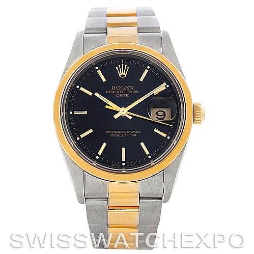 This image shows a front angle of the Rolex Date 15203 Men's Steel and Gold (two tone) Black Dial 15203 Men's Steel and Gold (two tone) Black Dial model watch, highlighting the dial, bezel, bracelet, and date window.