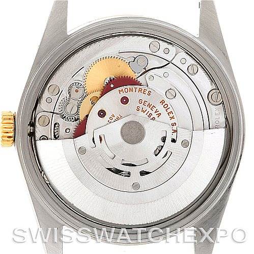 This image shows the detailed view of the movement and inner mechanism of a Rolex Date 15203 Men's Steel and Gold (two tone) Black Dial 15203 Men's Steel and Gold (two tone) Black Dial model watch from the back angle.