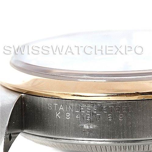 This image shows a side angle of the casing for a Rolex Date 15203 Men's Steel and Gold (two tone) Black Dial 15203 Men's Steel and Gold (two tone) Black Dial model, highlighting the stainless steel engravings.