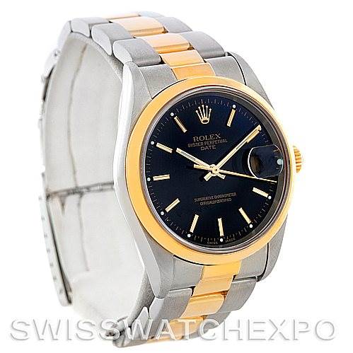 The image shows a Rolex Date 15203 Men's Steel and Gold (two tone) Black Dial 15203 Men's Steel and Gold (two tone) Black Dial model from a three-quarter front angle, highlighting its black dial, gold bezel, and two-tone bracelet.