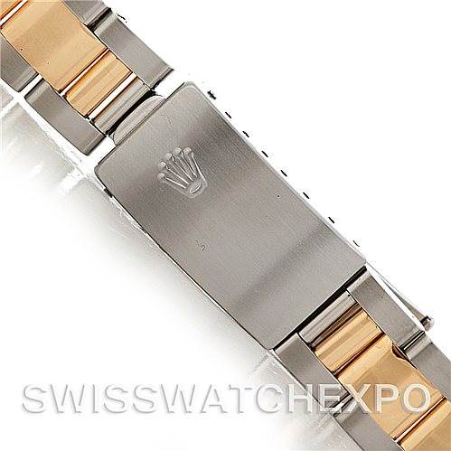 The image shows the clasp of a Rolex Date 15223 Men's Steel and Gold (two tone) Silver Dial 15223 Men's Steel and Gold (two tone) Silver Dial model watch, focusing on the brand logo and part of the two-tone bracelet.