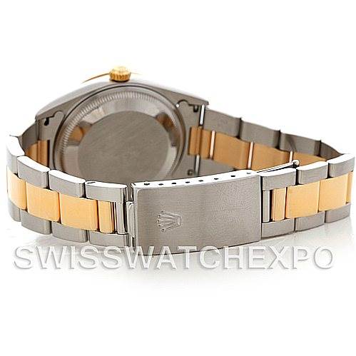 The image shows a rear view of the Rolex Date 15223 Men's Steel and Gold (two tone) Silver Dial 15223 Men's Steel and Gold (two tone) Silver Dial model, highlighting its two-tone bracelet and closed clasp.