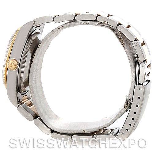 This image shows a side view of a Rolex Date 15223 Men's Steel and Gold (two tone) Silver Dial 15223 Men's Steel and Gold (two tone) Silver Dial model watch, highlighting the bracelet, crown, and part of the case.