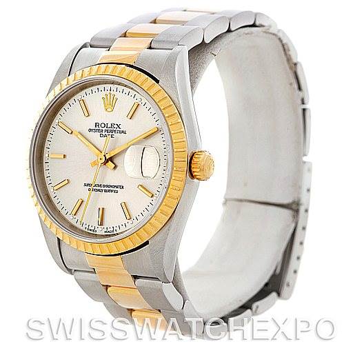 The Rolex Date 15223 Men's Steel and Gold (two tone) Silver Dial 15223 Men's Steel and Gold (two tone) Silver Dial model watch is shown at a three-quarter angle, highlighting its dial, bezel, and two-tone bracelet.