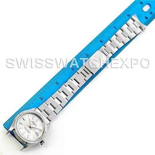 The image shows a Rolex Date 15210 Men's Stainless Steel Silver Dial 15210 Men's Stainless Steel Silver Dial model watch placed alongside a ruler, displaying its full length and bracelet.