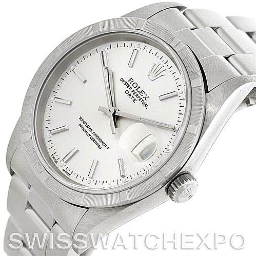 This image shows a close-up side angle of a Rolex Date 15210 Men's Stainless Steel Silver Dial 15210 Men's Stainless Steel Silver Dial model, highlighting the dial, bezel, crown, and part of the bracelet.
