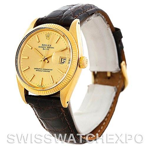 The Rolex Date 1503 Men's Yellow Gold Champagne Dial 1503 Men's Yellow Gold Champagne Dial model is shown at an oblique angle, highlighting its gold case, crown, dial, date window, and leather strap.