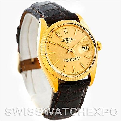 The image shows the front and slightly angled view of a Rolex Date 1503 Men's Yellow Gold Champagne Dial 1503 Men's Yellow Gold Champagne Dial model watch, highlighting its gold dial and leather strap.