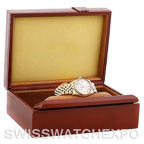 This image shows a front angle of a Rolex Date 15037 Men's Yellow Gold Silver Dial 15037 Men's Yellow Gold Silver Dial model watch in an open wooden box with a yellow interior.