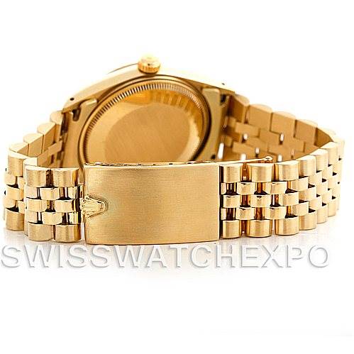 The image shows the back of a Rolex Date 15037 Men's Yellow Gold Silver Dial 15037 Men's Yellow Gold Silver Dial model watch with a focus on its gold bracelet and clasp.