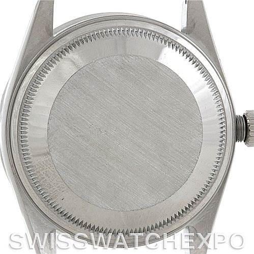 The image shows the rear view of the Rolex Date 15210 Men's Stainless Steel Black Dial 15210 Men's Stainless Steel Black Dial model watch case, featuring the case back and its fluted edges.