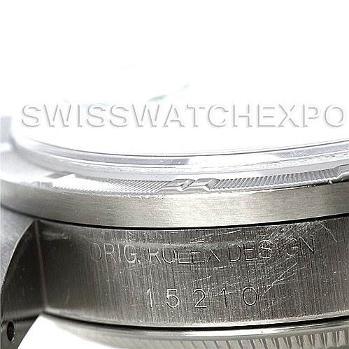This image shows a close-up of the side of a Rolex Date 15210 Men's Stainless Steel Black Dial 15210 Men's Stainless Steel Black Dial model watch, highlighting the engraved model number 15210 and the bezel.