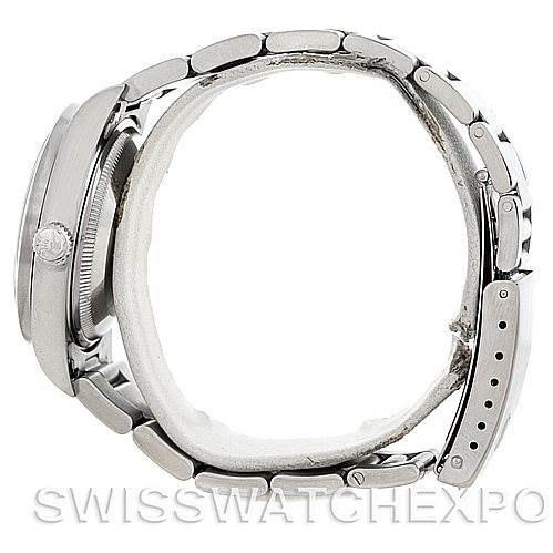 Side view of a Rolex Date 15210 Men's Stainless Steel Black Dial 15210 Men's Stainless Steel Black Dial model watch showing the full metal bracelet and case, including the crown and clasp.