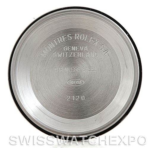 The image shows the inner case back of a Rolex Date 15210 Men's Stainless Steel White Dial 15210 Men's Stainless Steel White Dial model watch, displaying engravings of brand markings and material information.