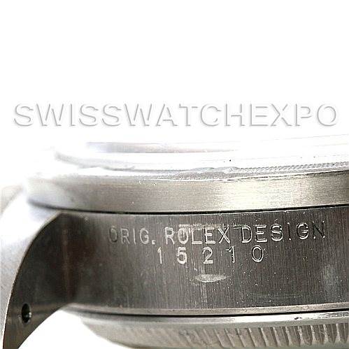The image shows a close-up side view of a Rolex Date 15210 Men's Stainless Steel White Dial 15210 Men's Stainless Steel White Dial model watch case with "ORIG. ROLEX DESIGN 15210" engraved.