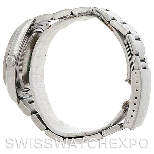 This image shows a side view of a Rolex Date 15210 Men's Stainless Steel White Dial 15210 Men's Stainless Steel White Dial model watch, highlighting the crown, case, and bracelet.