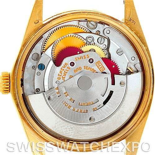 This image shows the inner workings and movement of a Rolex Date 1501 Men
s Yellow Gold Silver Dial 1501 Men
s Yellow Gold Silver Dial model watch, viewed from the back case.