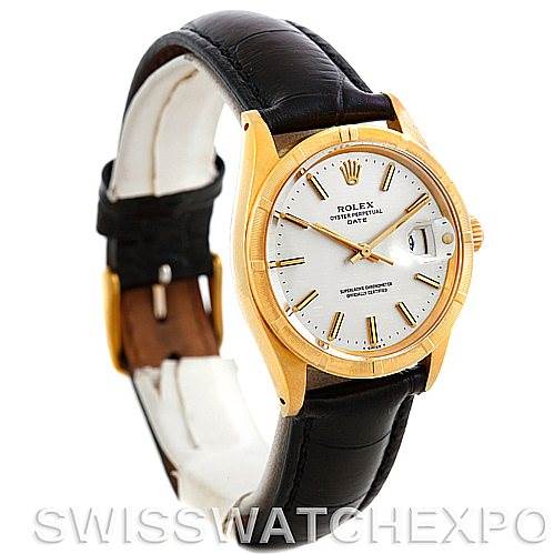 This image shows a Rolex Date 1501 Men
s Yellow Gold Silver Dial 1501 Men
s Yellow Gold Silver Dial model wristwatch from a front angle, highlighting its gold case, white dial, leather strap, and crown.