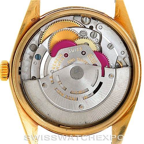 The image shows the movement mechanism of a Rolex Date 1500 Men's Yellow Gold Blue Dial 1500 Men's Yellow Gold Blue Dial model watch from a back view without the case back.
