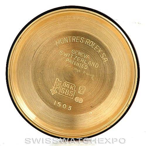 This image shows the interior of a case back for a Rolex Date 1503 Men's Yellow Gold Brown Dial 1503 Men's Yellow Gold Brown Dial model watch, displaying its engravings and markings.