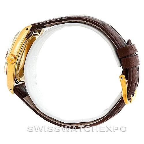 The photo shows a side view of the Rolex Date 1503 Men's Yellow Gold Brown Dial 1503 Men's Yellow Gold Brown Dial watch, highlighting the crown, case, and brown leather strap.