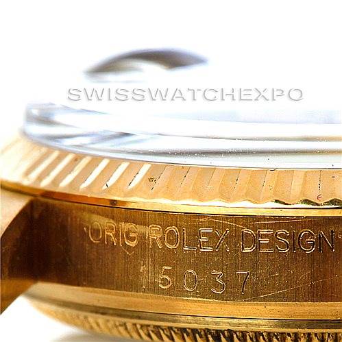 This image shows a close-up of the side of a Rolex Date 15037 Men's Yellow Gold Black Dial 15037 Men's Yellow Gold Black Dial model watch, highlighting the engraved details on the case.