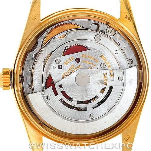 This image shows the internal movement and mechanics of a Rolex Date 15037 Men's Yellow Gold Black Dial 15037 Men's Yellow Gold Black Dial model watch from a rear, open-back perspective.